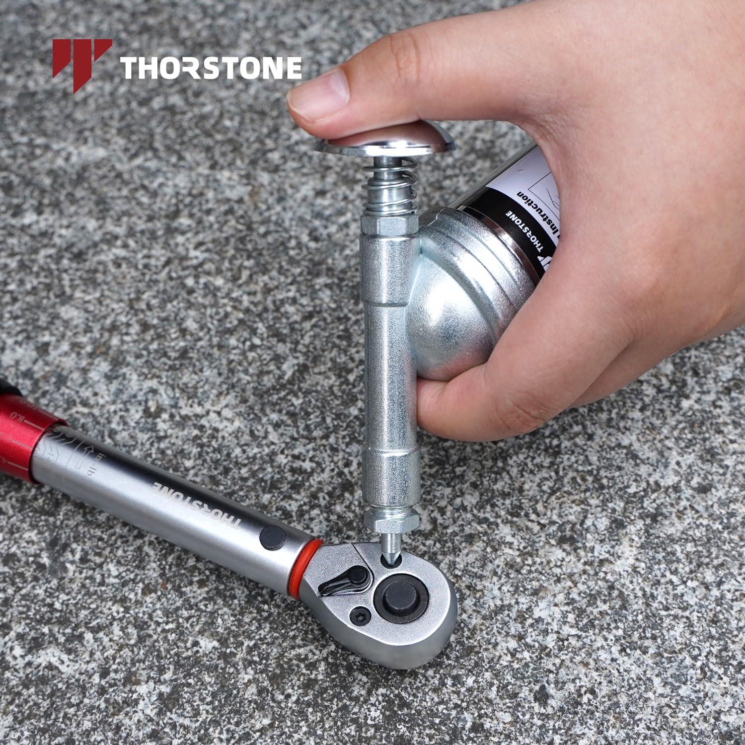 Easy-refill feature of the Thorstone grease gun reduces downtime between jobs.
