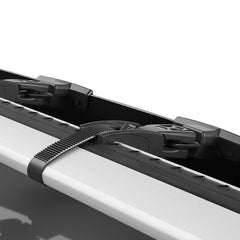 Thule AirScreen XT wind fairing mounted on roof rack bar illustrating tool-free installation.