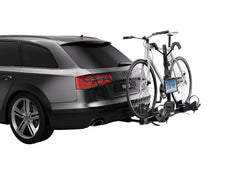 Thule black license plate holder attached to a rack with secure fit