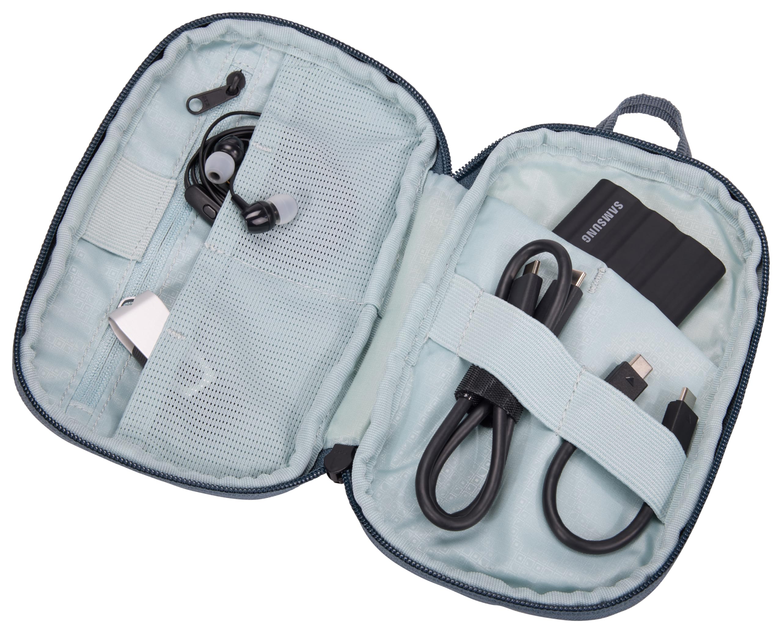 Thule Subterra PowerShuttle Small inside a backpack for organized travel