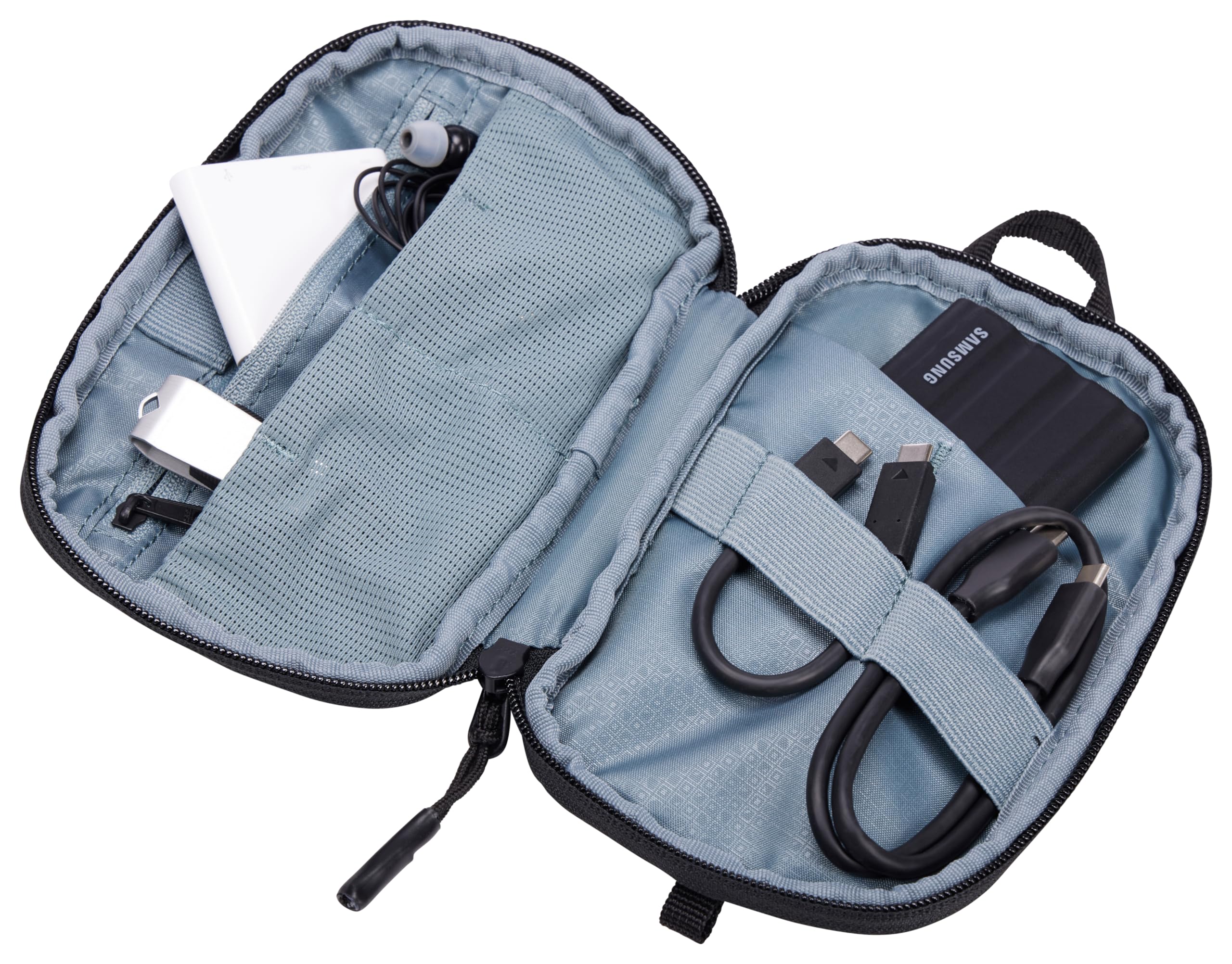 Thule Subterra PowerShuttle elastic loops securing chargers and earbuds during transit