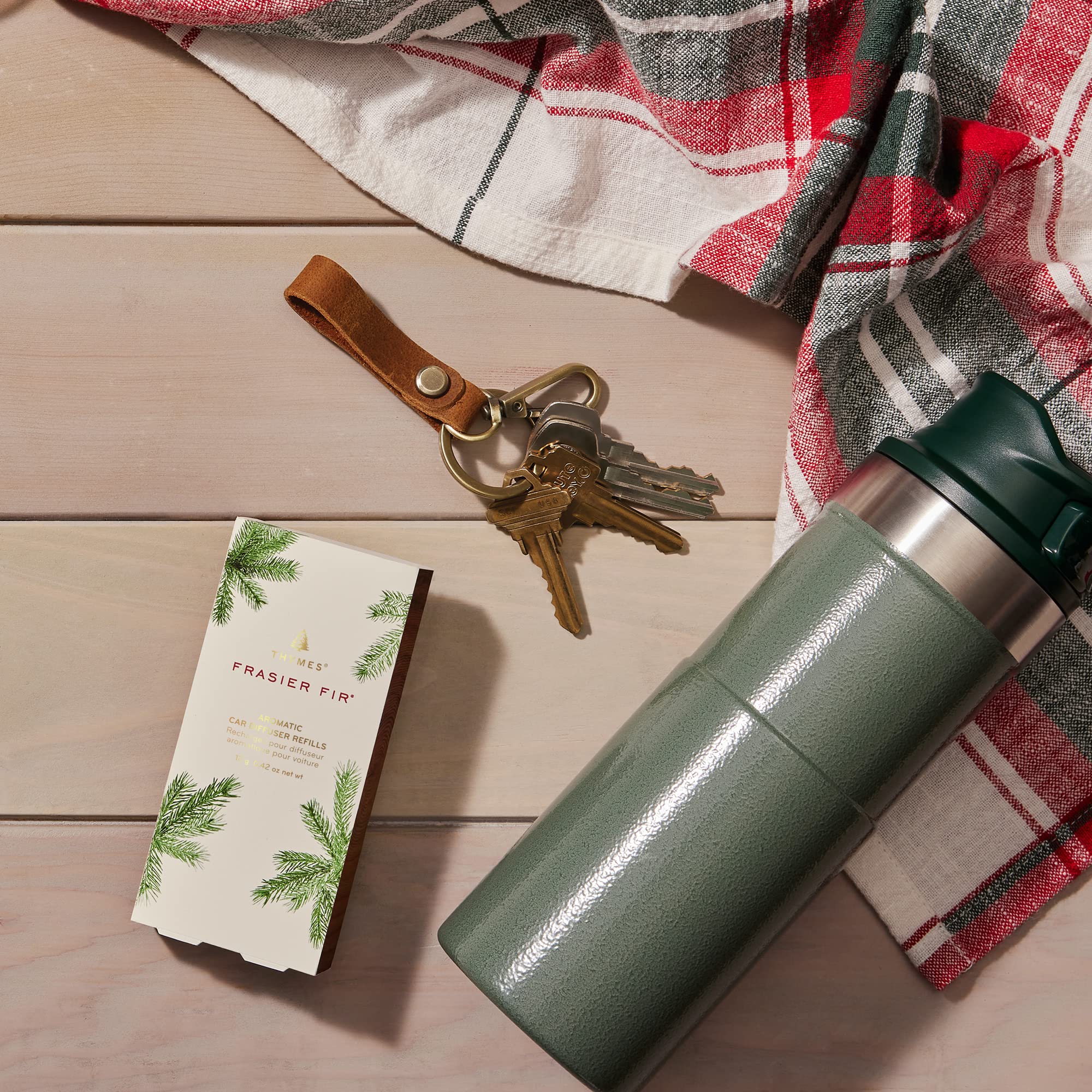 Frasier Fir pine and cedar notes enrich the car environment.