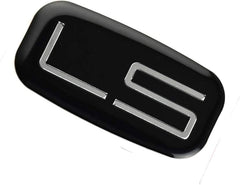 Tilvst 2pcs emblem set with self-adhesive backing for easy install.