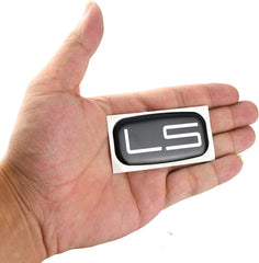 Tilvst LS cab badge replacement on a roof pillar, durable exterior look.