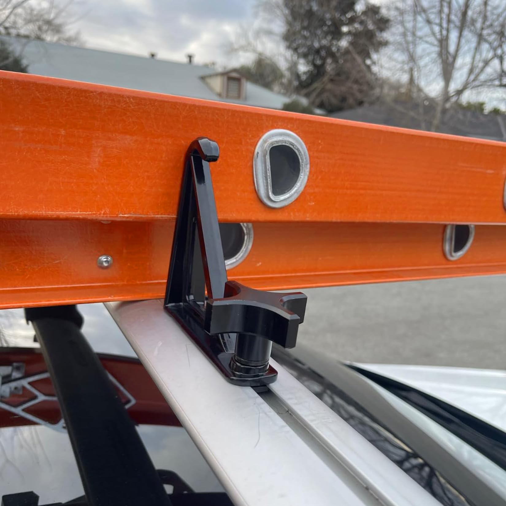 Timilge load stops help prevent movement of gear on crossbars.