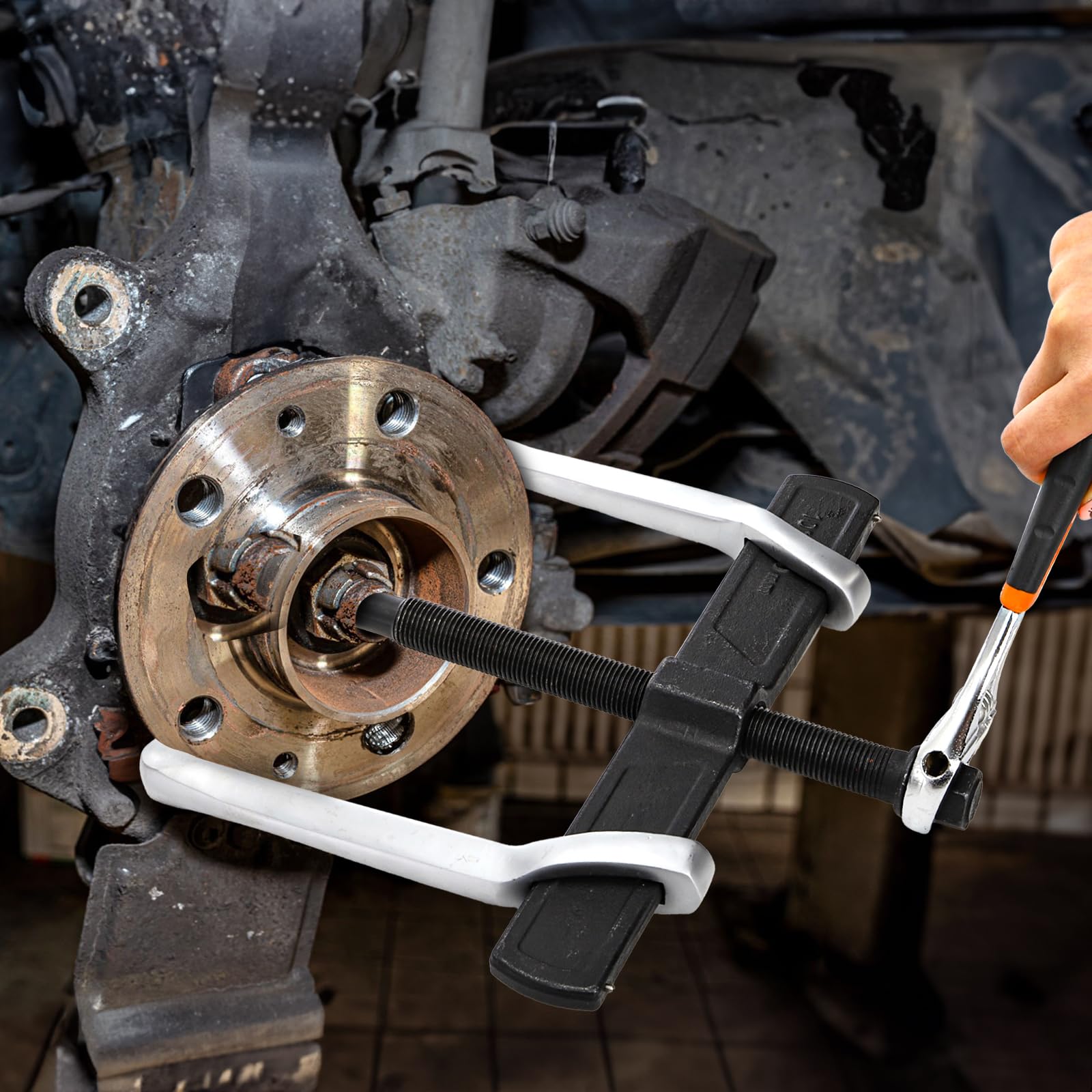 Tlence gear puller in automotive wheel removal setup highlighting versatility