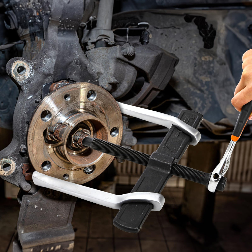 Tlence gear puller in automotive wheel removal setup highlighting versatility