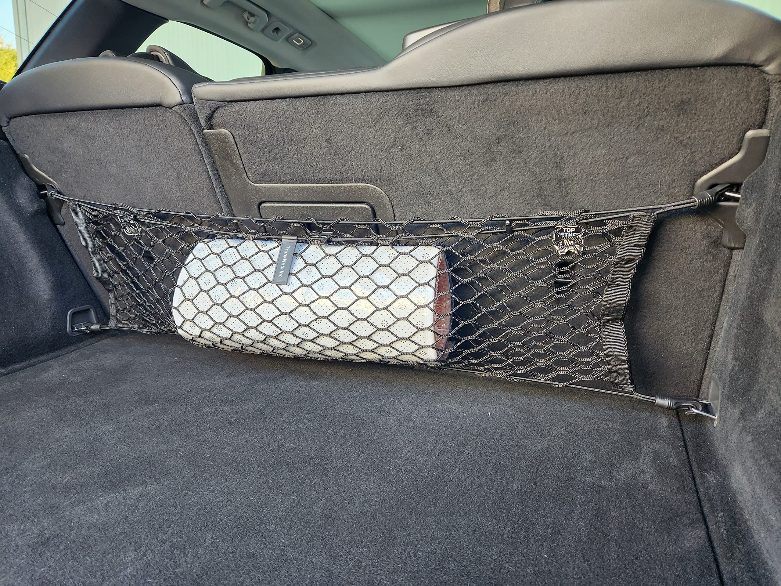 Close-up of premium polypropylene mesh showing stretch and durability