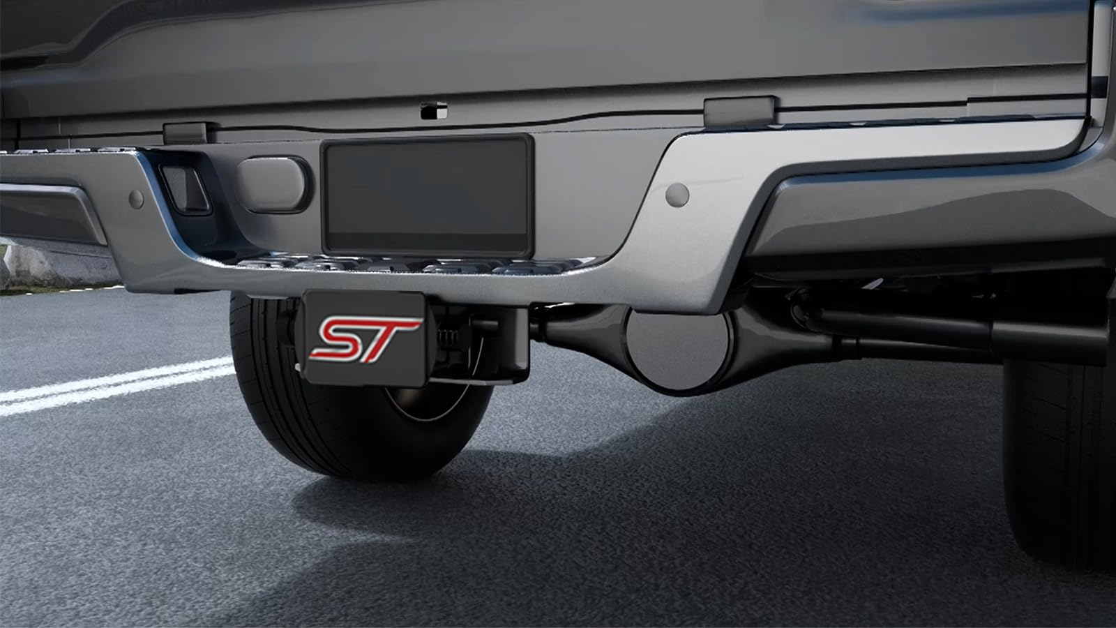 Rear vehicle with TOEASYTY hitch cover enhancing sport identity.
