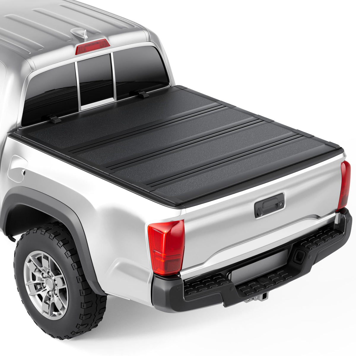 Tono King hard low-profile quad-fold cover on a 60-inch Tacoma bed showing sleek protection