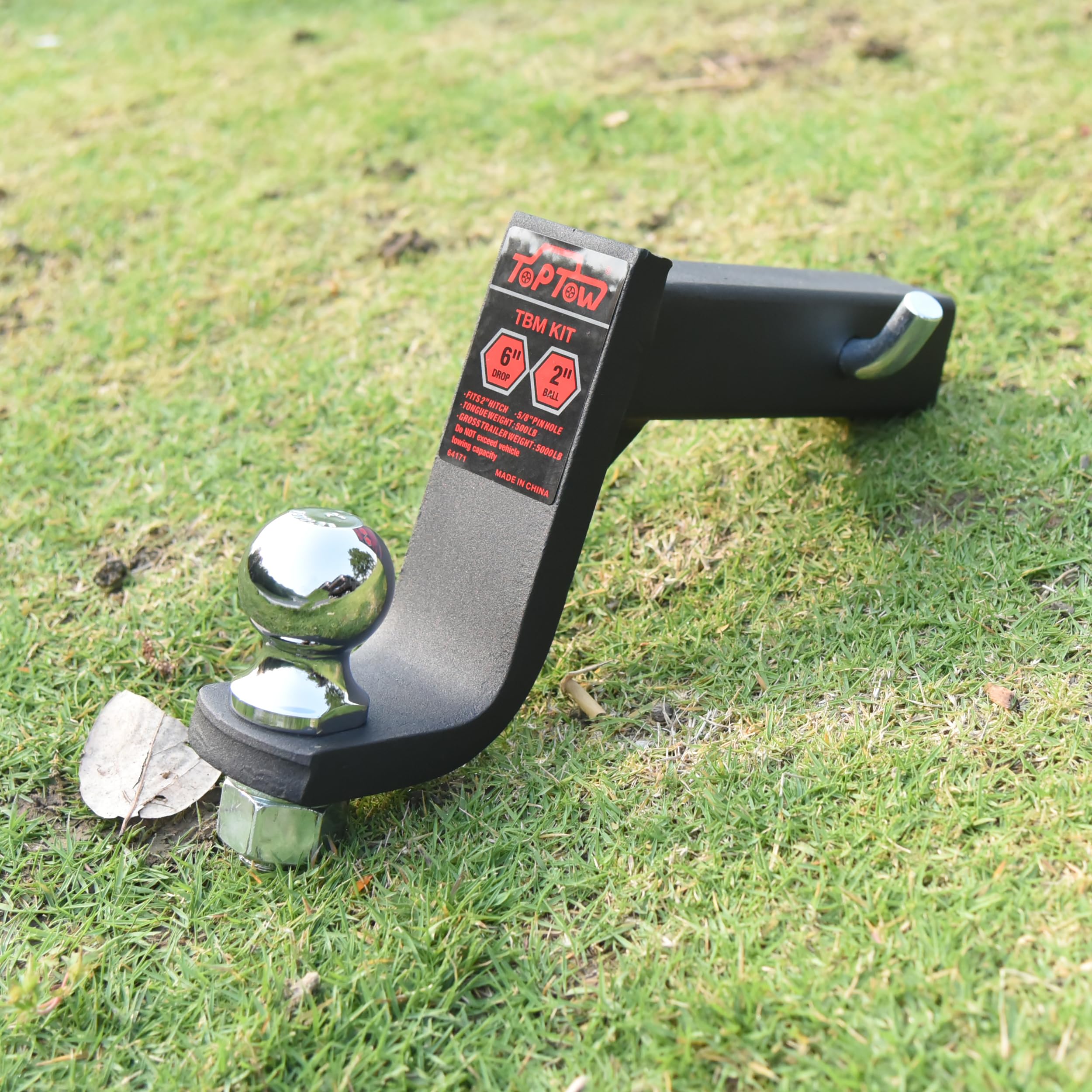 TOPTOW hitch pin and clip securing the connection for towing.