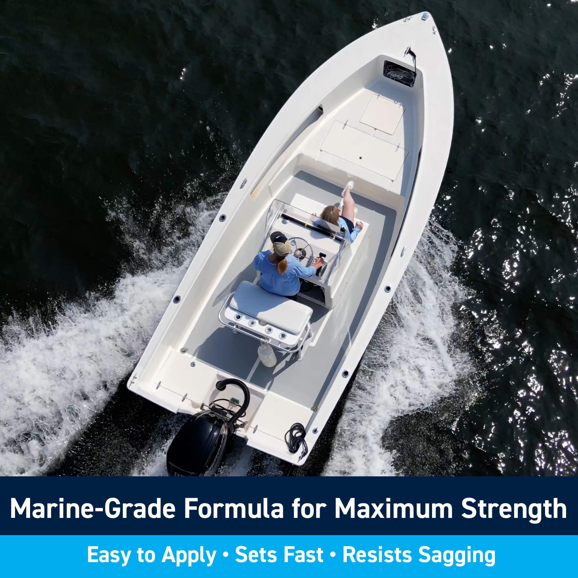TotalBoat Polyester Structural Repair Putty spreading on hull for solid bonding.