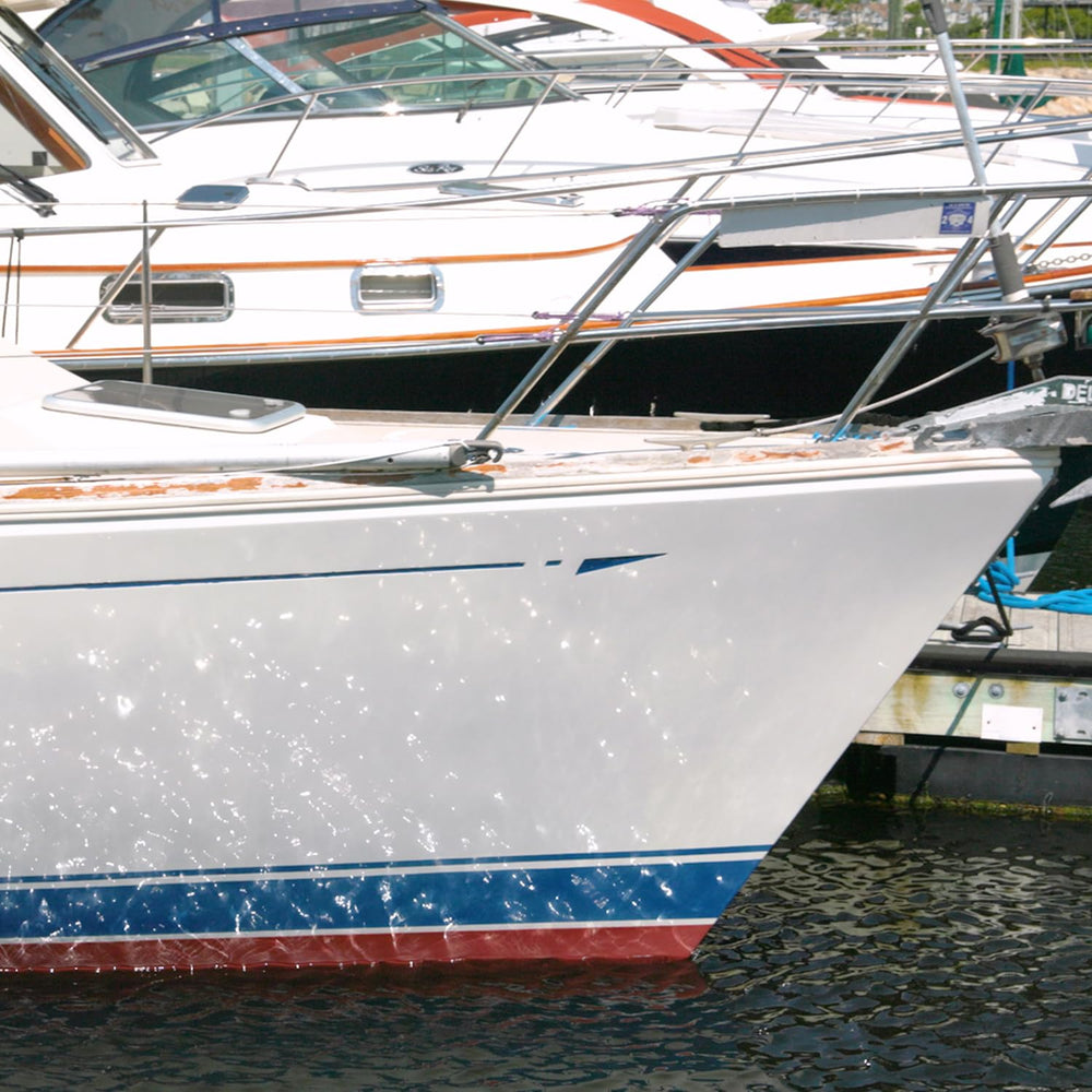 TotalBoat TotalBuff with wool pad delivers aggressive cut on weathered gelcoat.