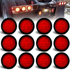 Traberm 4in round red LED tail light showing brake and turn signal for trailers.