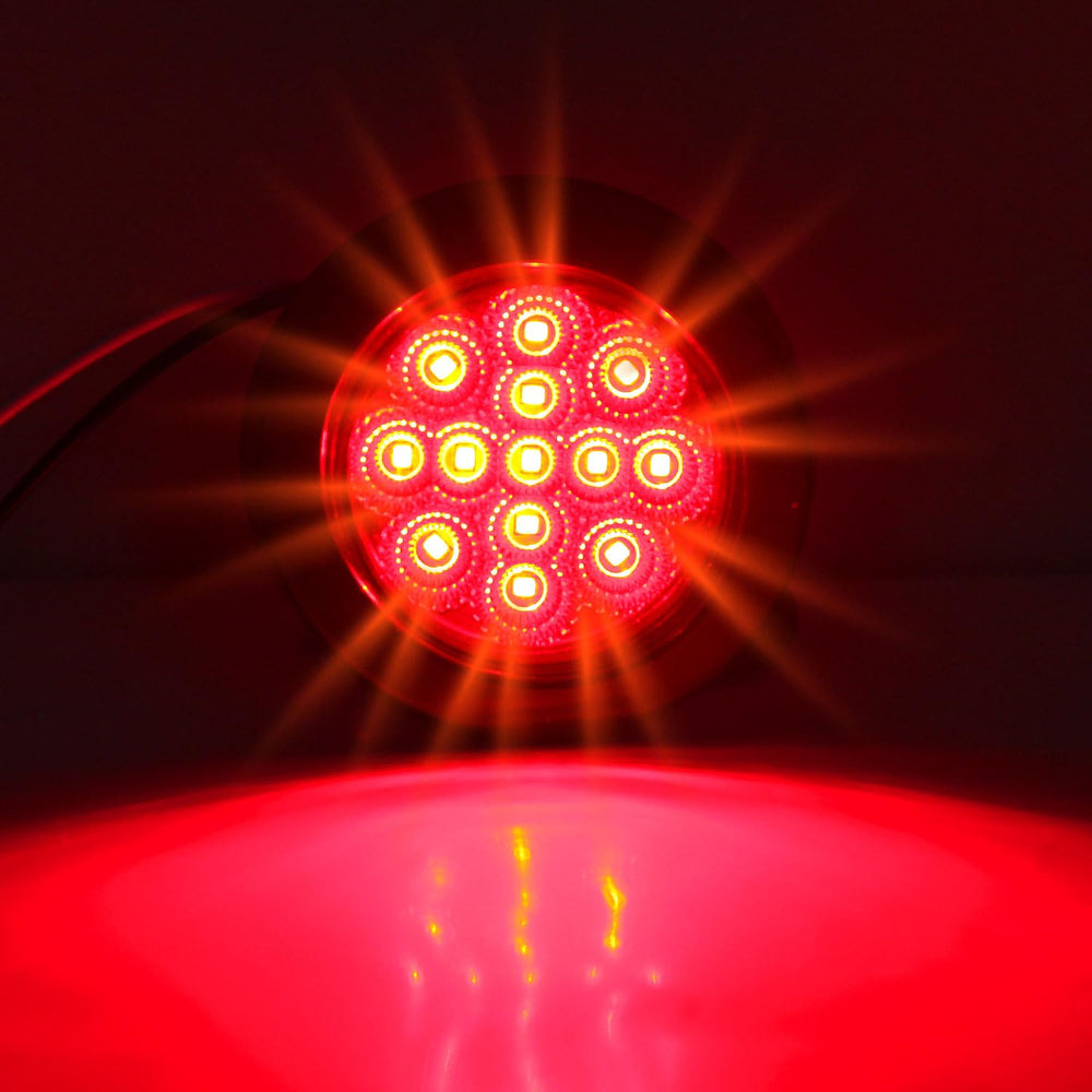 Traberm round red marker light with 13 LEDs and reflector for clear signaling.