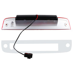 Rear view of a vehicle with Tresound LED 3rd brake light in chrome housing.
