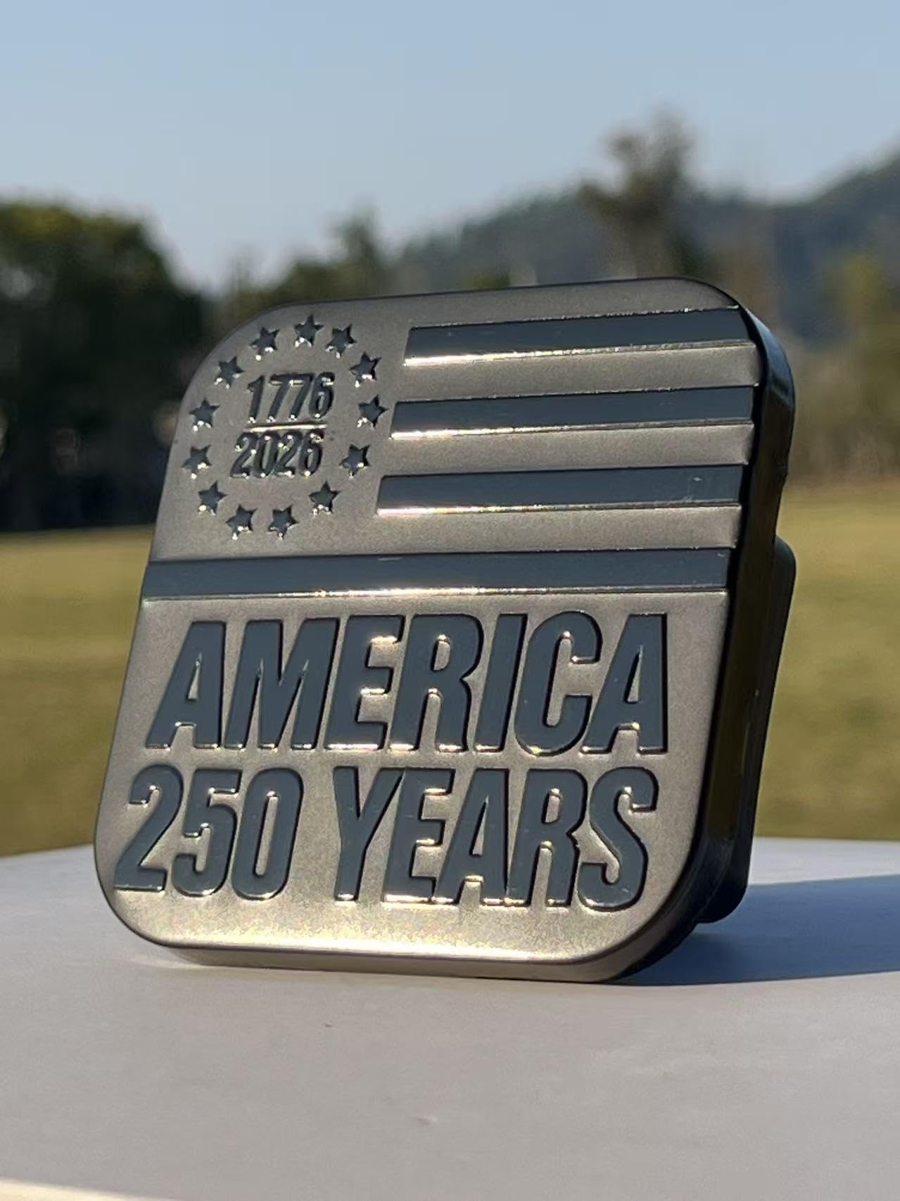 TrkWyze hitch cover survives car washes and weather without peeling