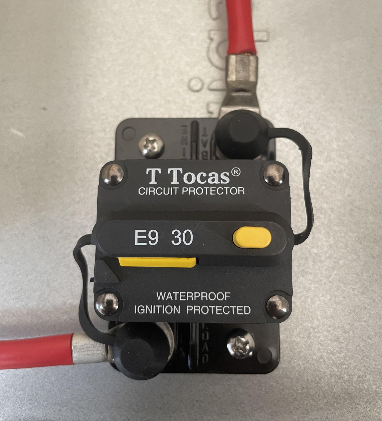 TTocas E9 side panel mount showing compact design for tight installations