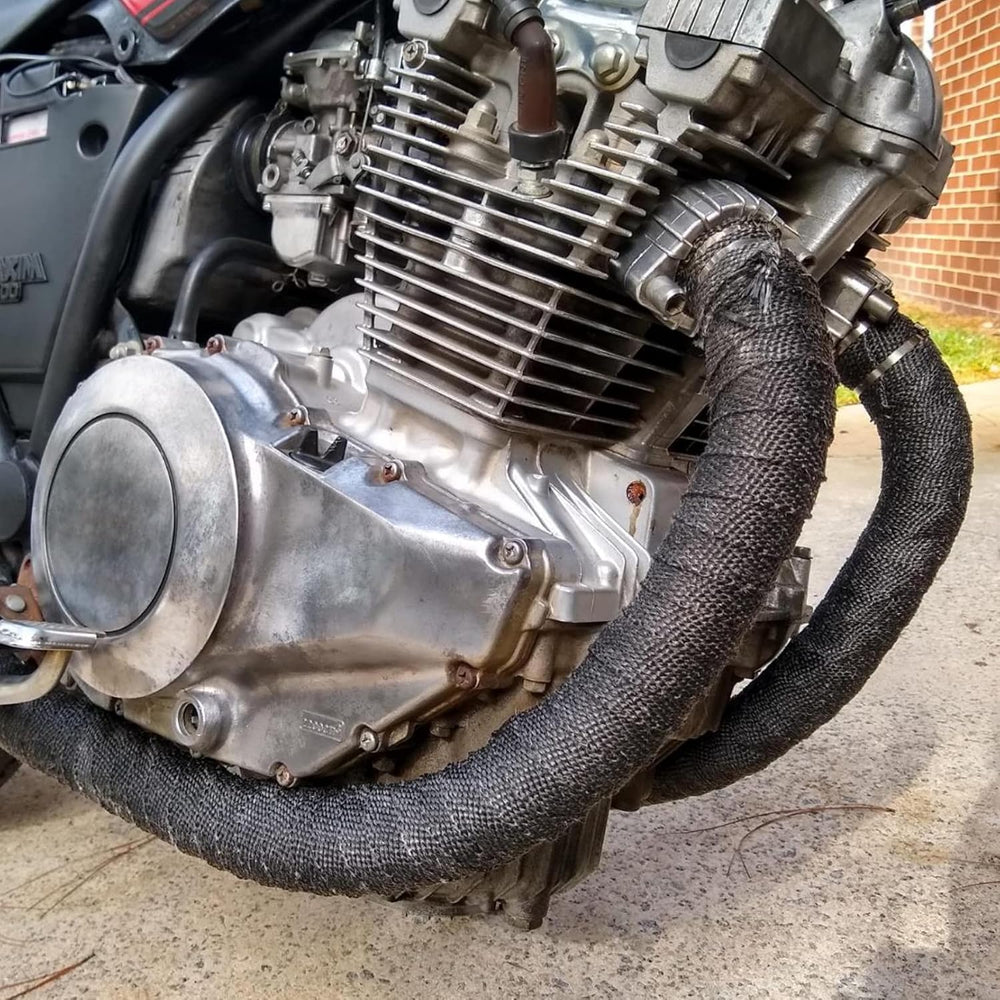 Under-hood heat protection concept with wrapped exhaust