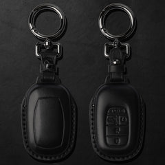 Tukellen leather key fob case for 4/5-button remotes preserves signal integrity.