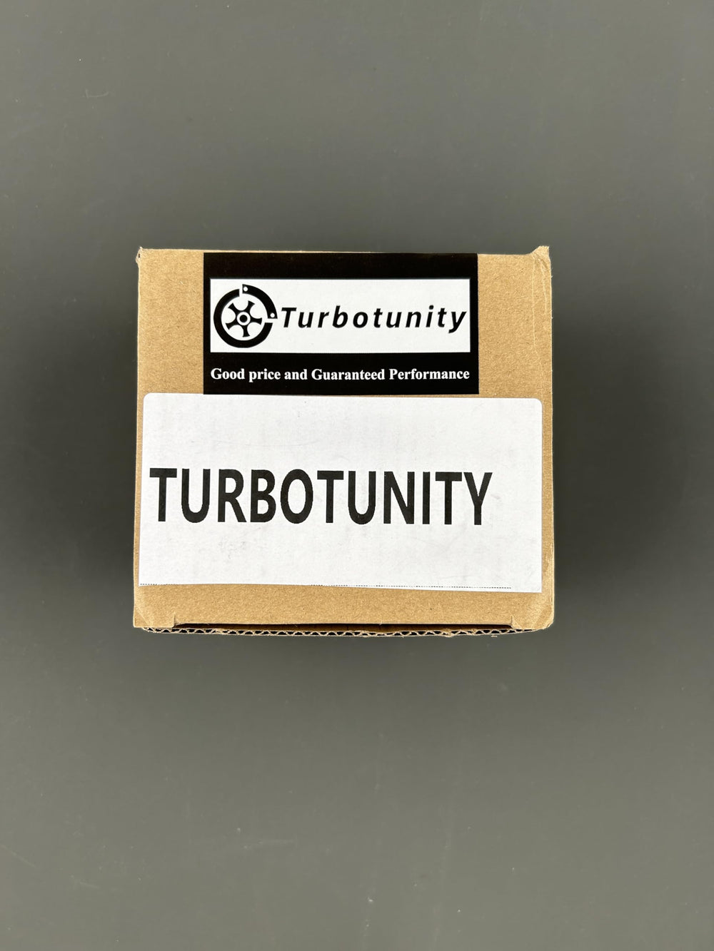 TURBOTUNITY contents image showing gaskets, insulator, fuel tubing, spark plug
