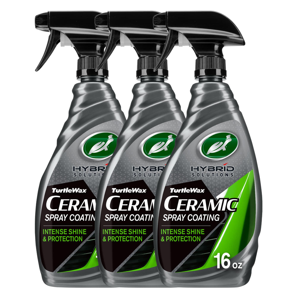 Turtle Wax Hybrid Solutions ceramic spray coating bottle showing beaded water for protection