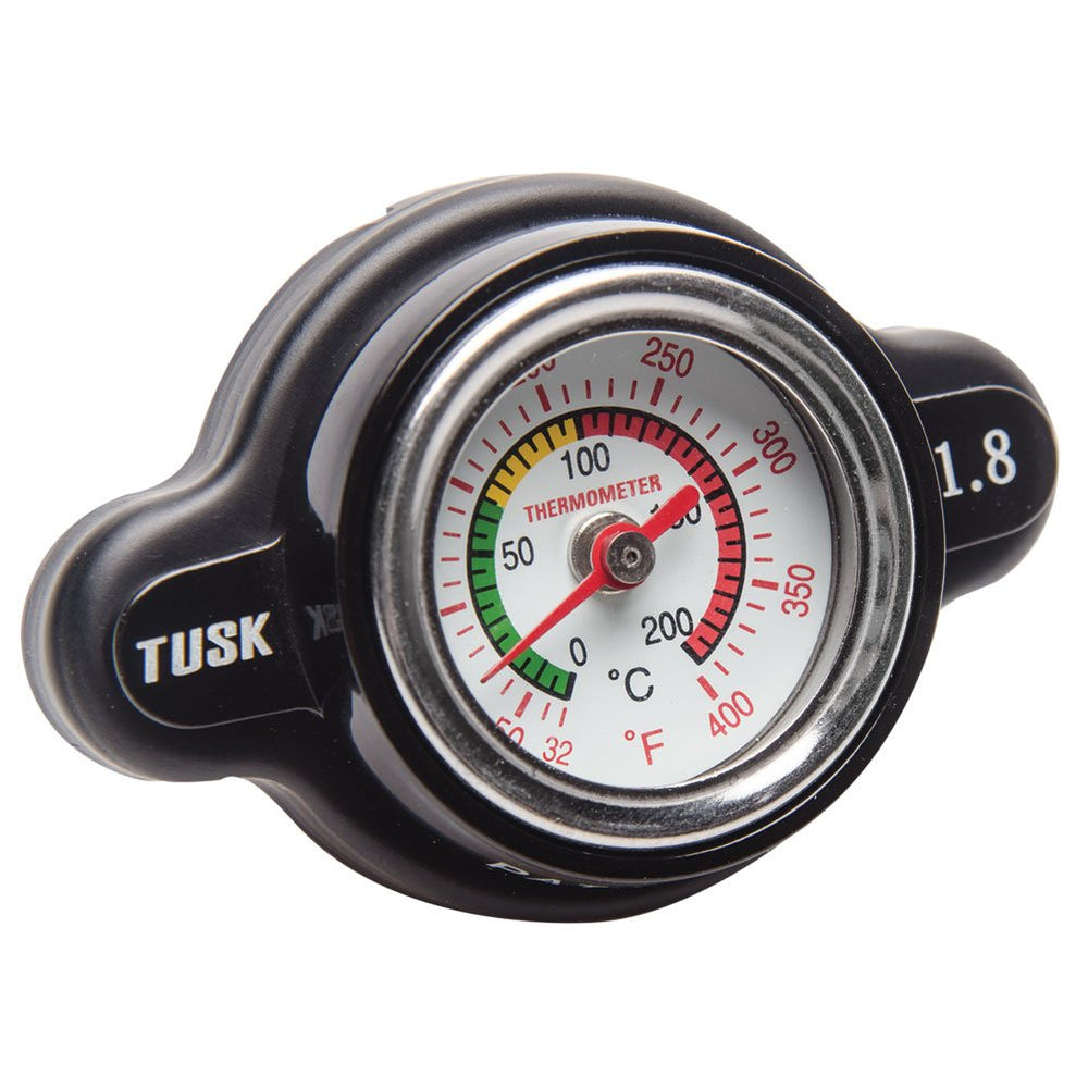 Tusk high-pressure radiator cap with temperature gauge enables quick temperature awareness on the trail.