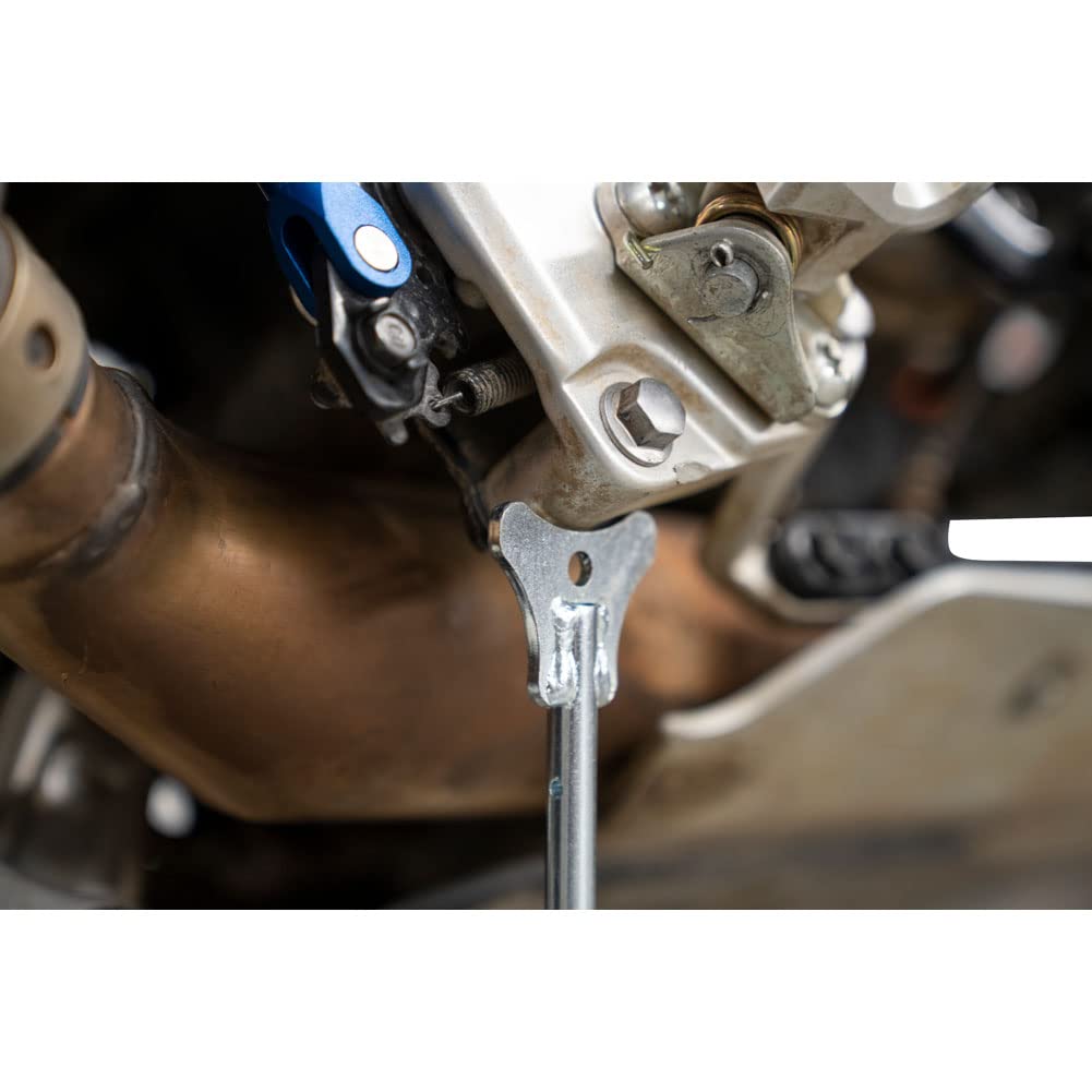 Tusk MotoCrutch positioned for wheel removal and chain adjustments