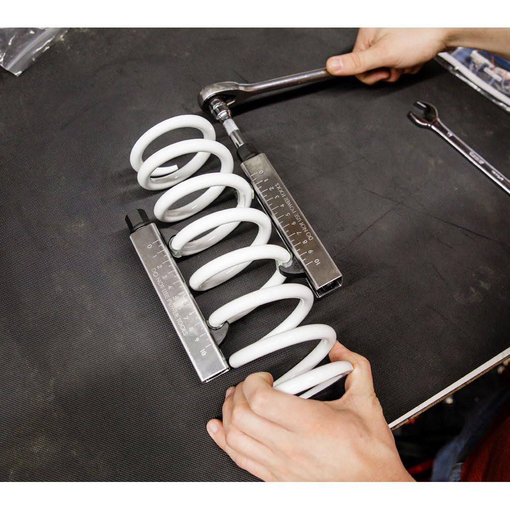 Tusk pair shown on motorcycle shocks ensures balanced, safe installation