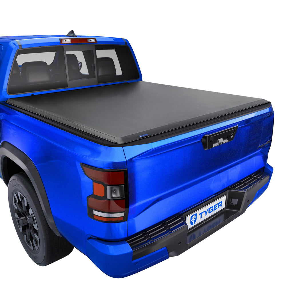 Tyger Auto T1 on Nissan Frontier 5' bed front view showing secured cover