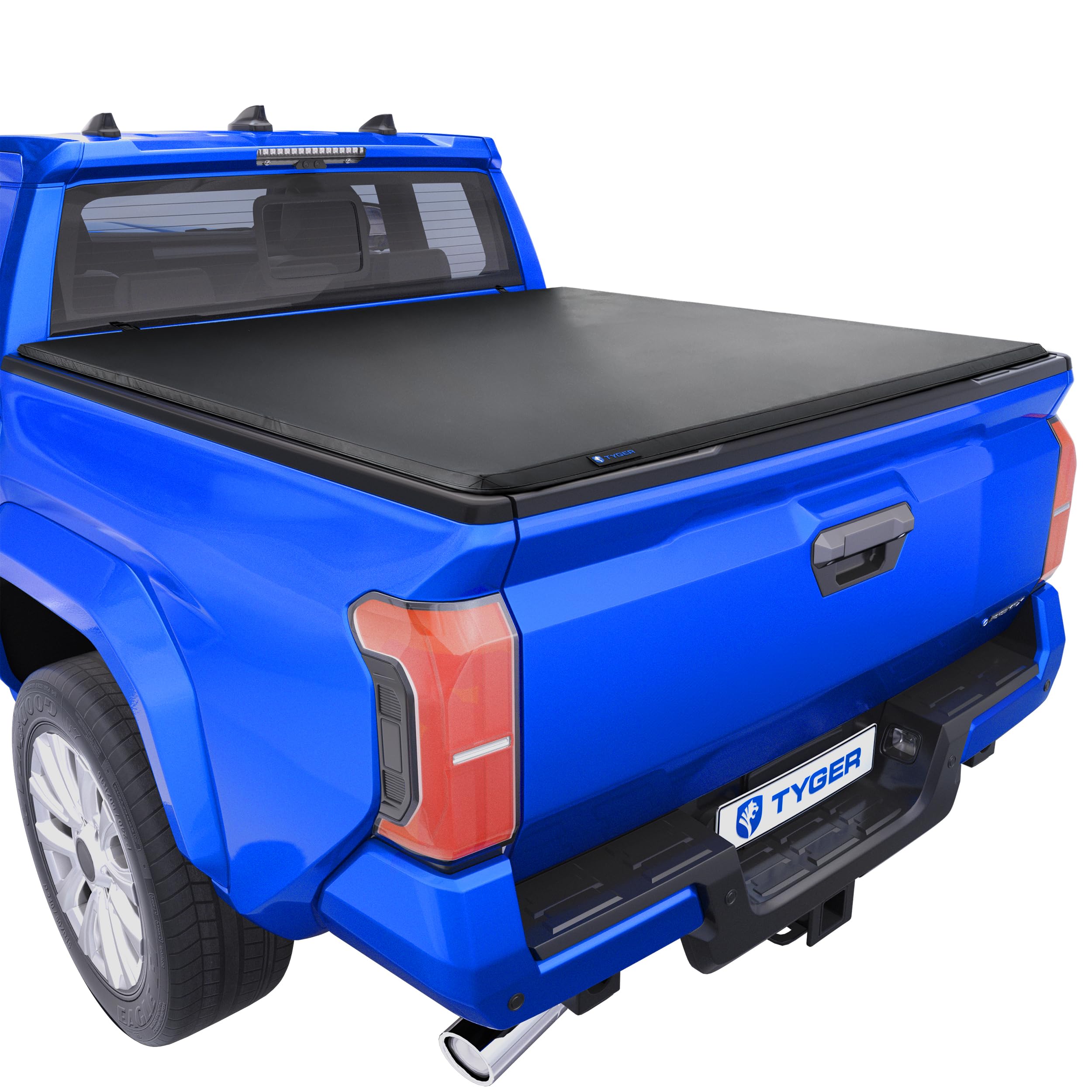 Tyger Auto T3 cover front view on Toyota Tacoma showing deck rail compatibility for secure cargo.