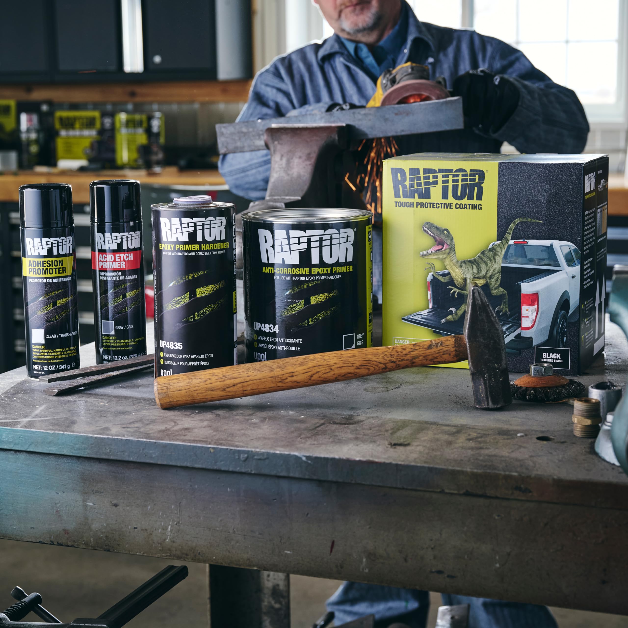 U-POL Raptor primer uses flat fan nozzle for even coverage across panels.
