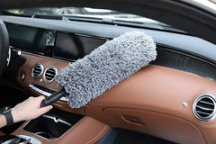 Upra Ultimate Car Duster microfiber fibers surround wide head for fast dust and pollen removal.