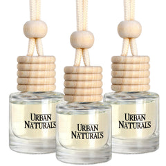 Urban Naturals Rouge 54 bottle with wooden cap showcases premium design for long-lasting scent.