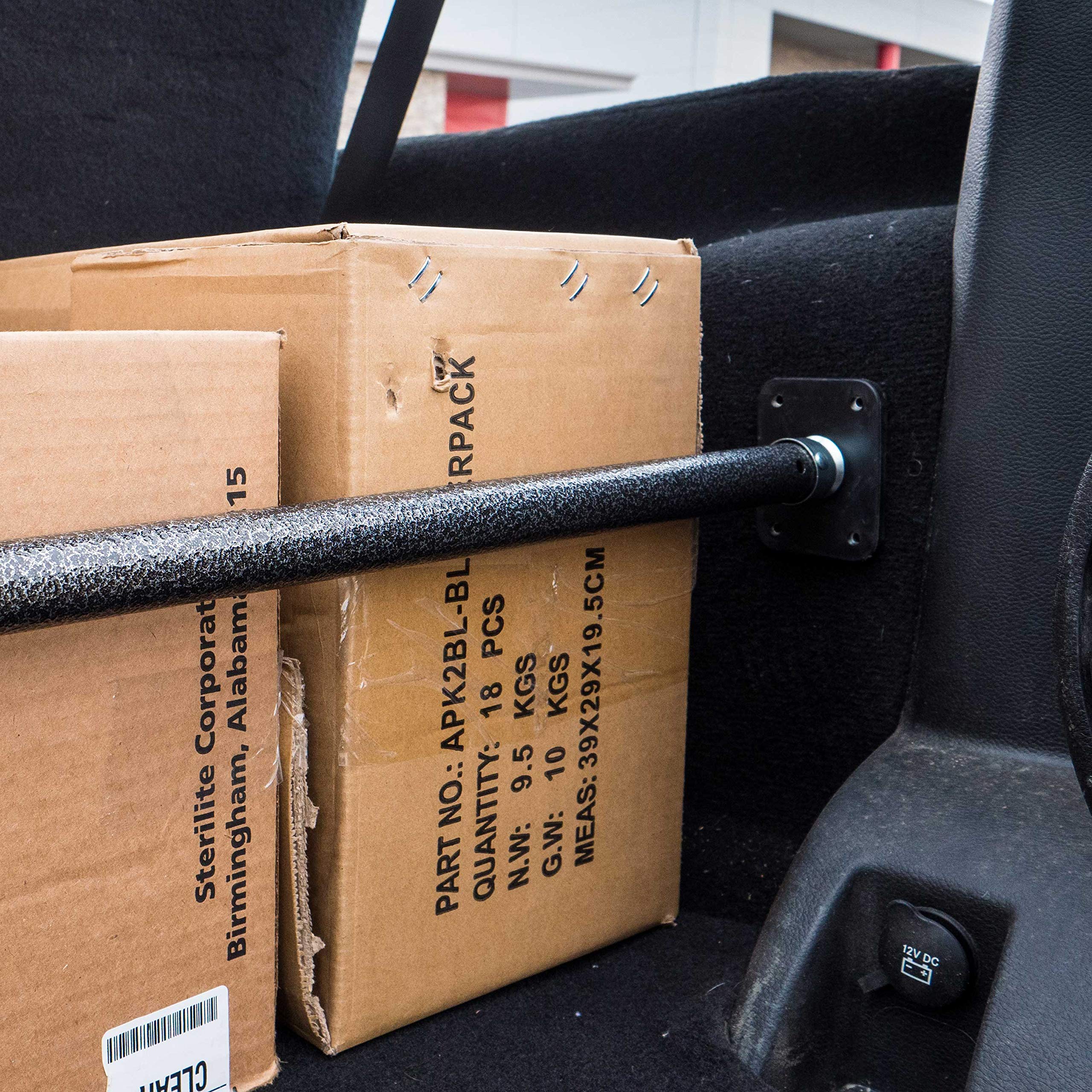 Versatile use of US Cargo Control bar in SUVs, minivans, and trailers