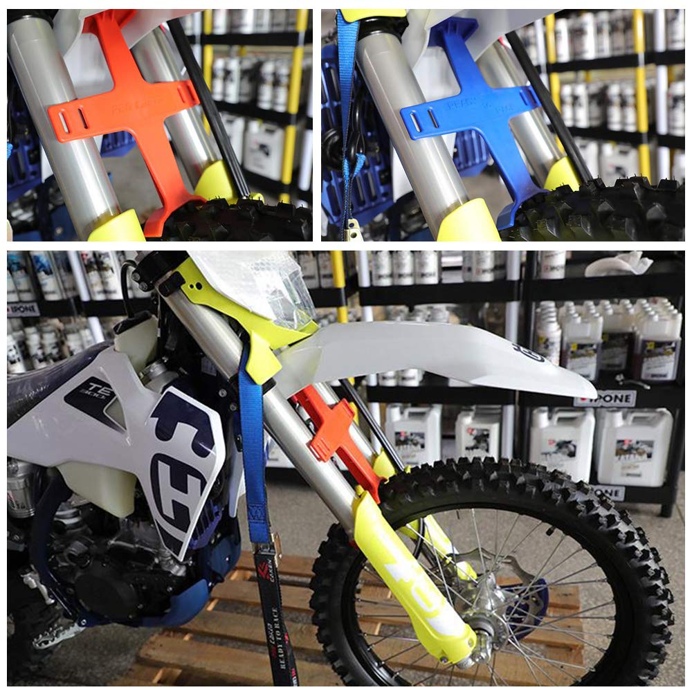 Brace securing a bike on a trailer prevents bounce during transit.