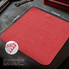 Utopia Towels red shop towels in use in a garage for quick oil absorption