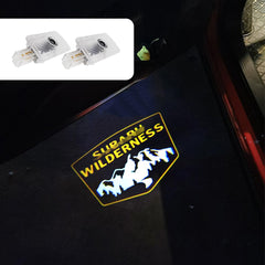 uunonaha Wilderness welcome light projects Forester logo on the front door for night entry.