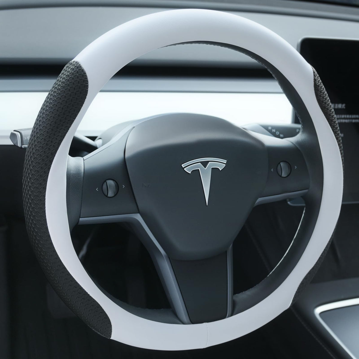 Uxcer premium leather steering cover on Tesla Model 3/Y for precise fit and luxury feel.