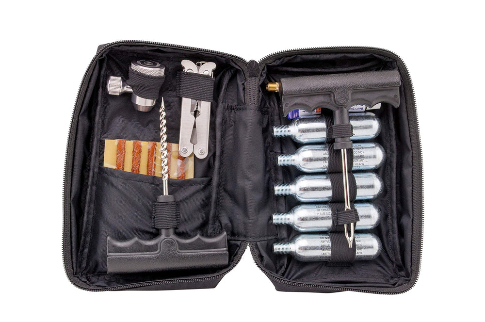 V1 Motor CO2 tubeless repair kit in a compact bag for roadside fixes.