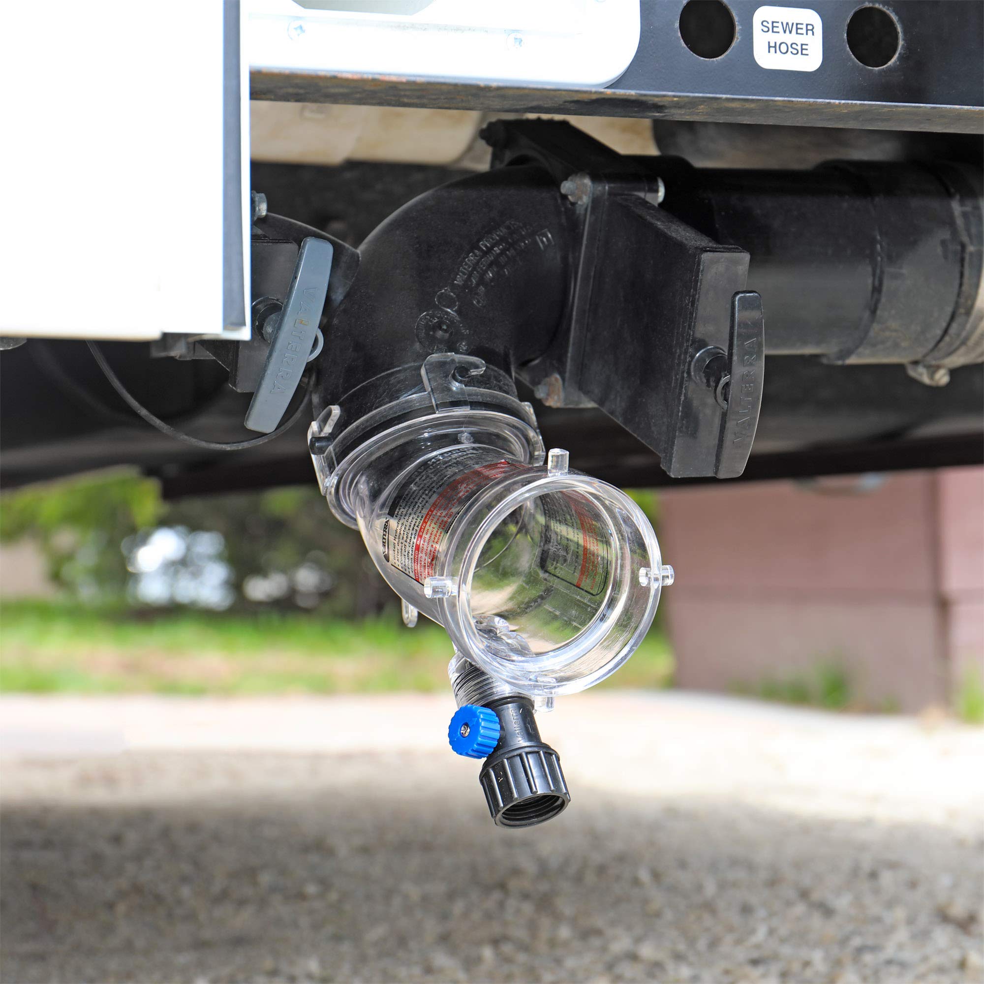 Rinsing action from Valterra Hydroflush targets tank, hoses, and valves.