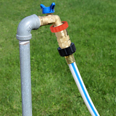 Valterra regulator attached to campground spigot reduces pressure and protects RV hoses.