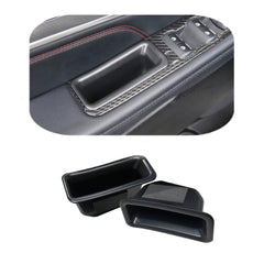 Vesul Front Row Door Side Storage Box beside the Explorer handle keeps essential items within easy reach.