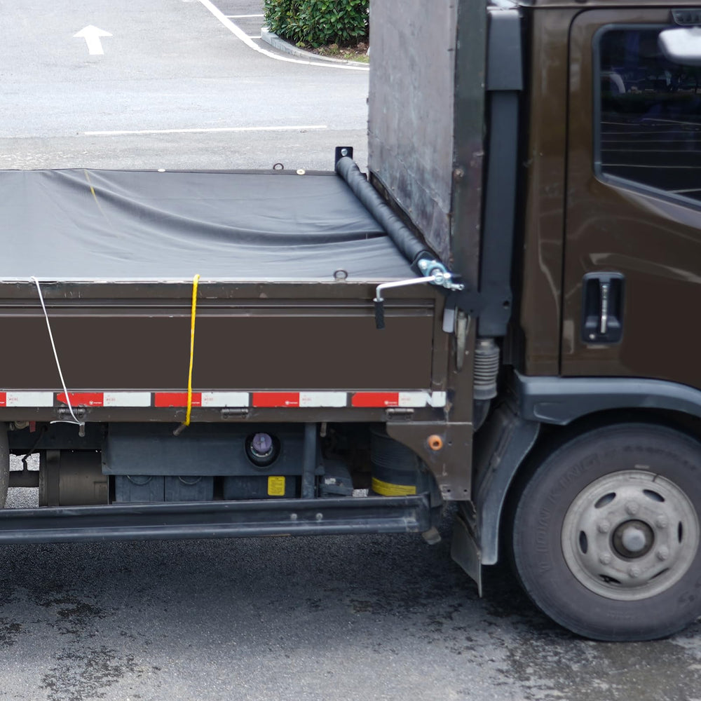VEVOR tarp roller in use on a dump truck for smooth operation.