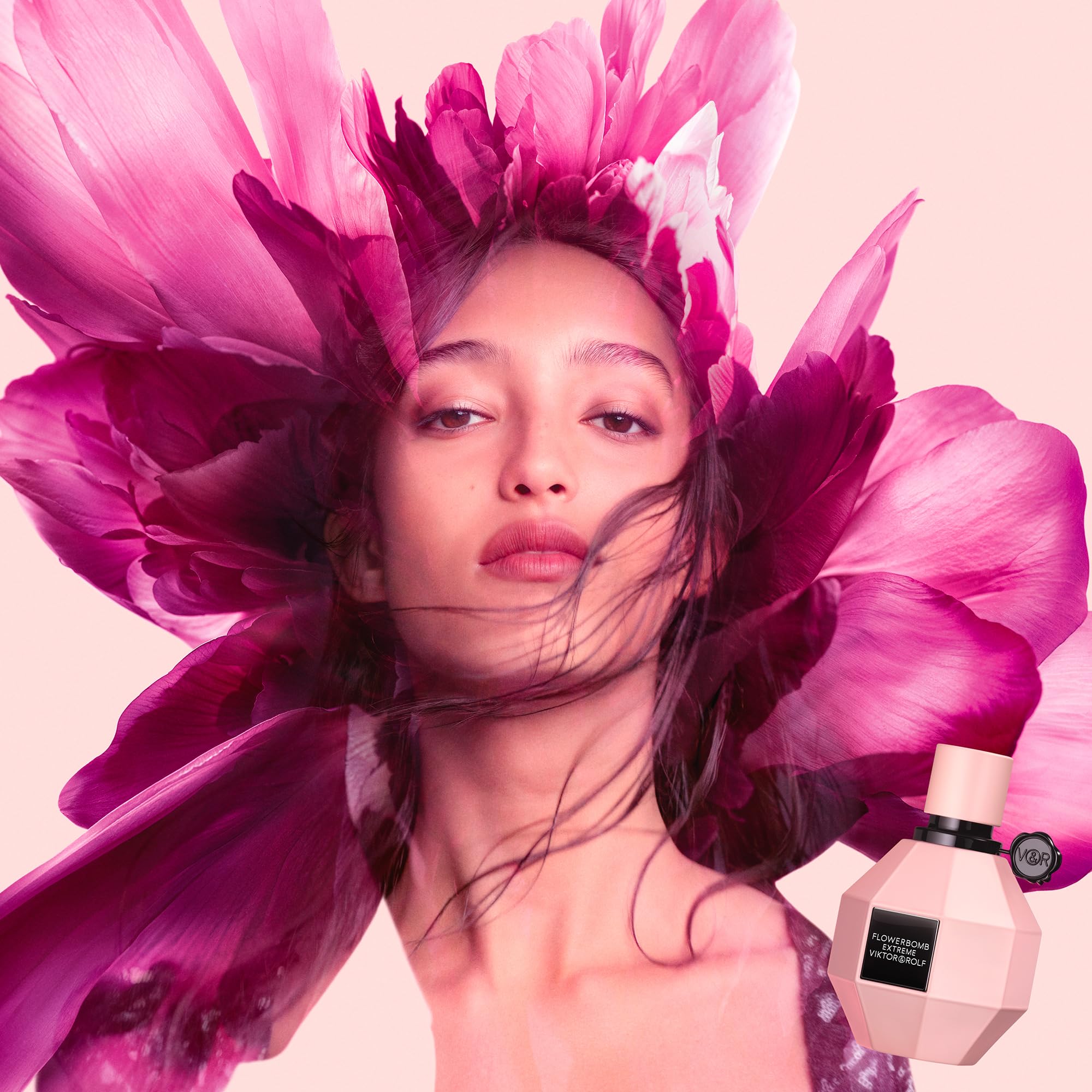 Application cues on knees and elbows for lasting scent in Flowerbomb Extreme