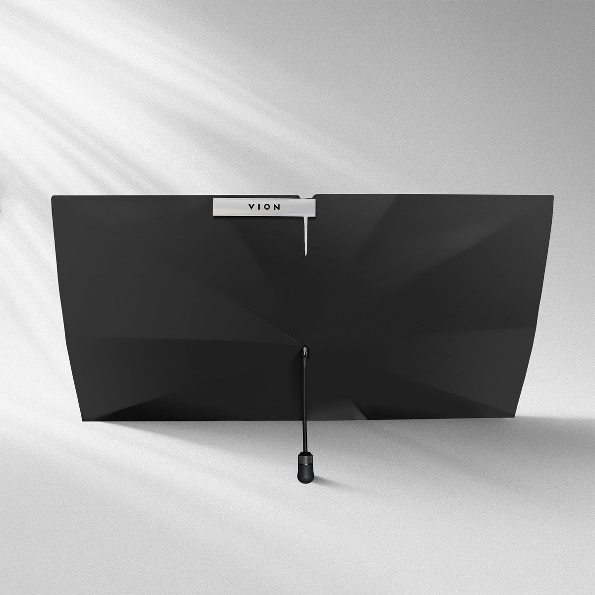 VION Tesla sunshade umbrella-style open for quick shade on sunny drives