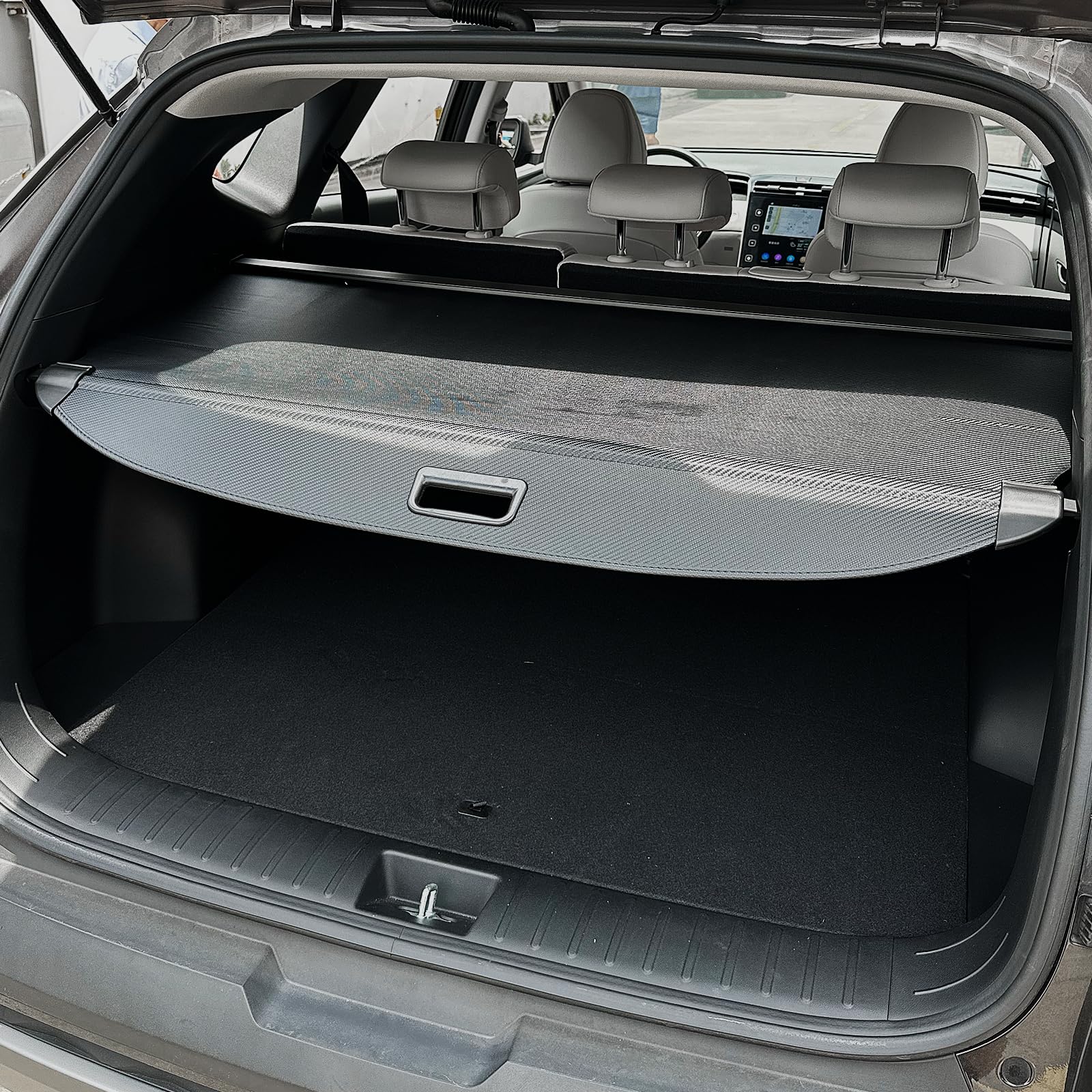 Volcaner cargo cover shields luggage from sun and prying eyes