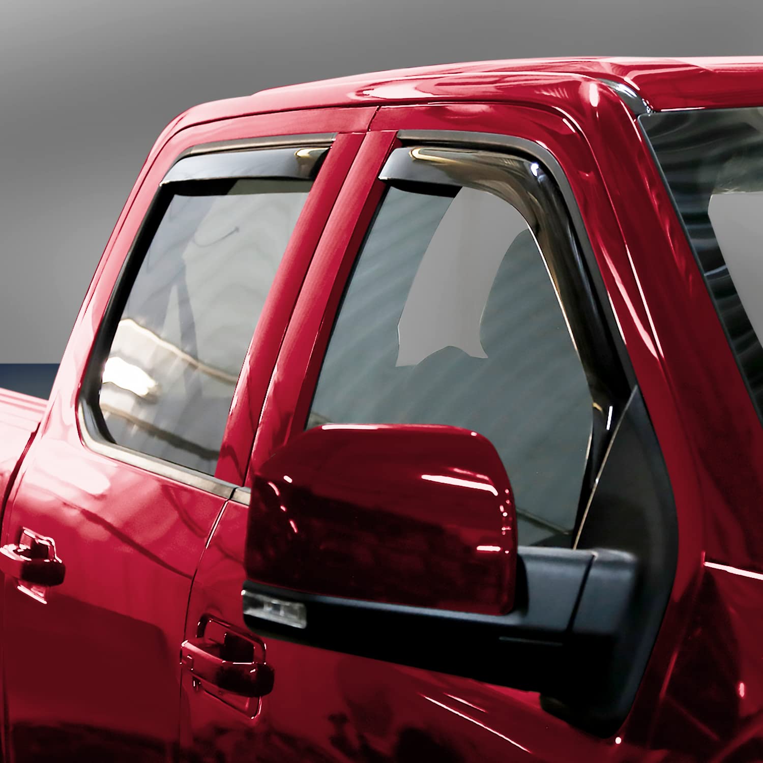 Voron Glass in-channel rain guard rear-left for Ford F-150, reduces rain splash while cruising.