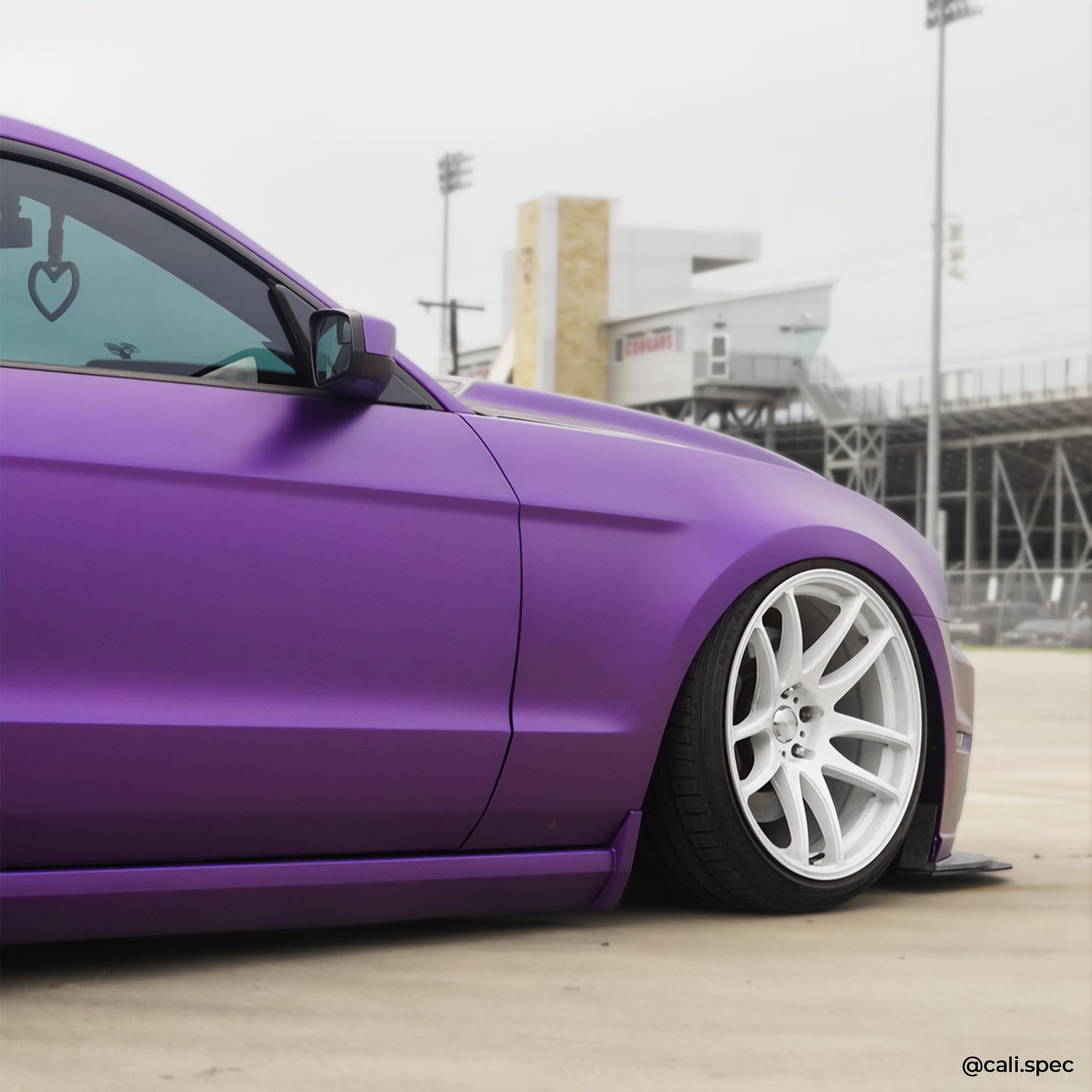 Self-healing matte purple surface showing scratches fading on VViViD+ wrap