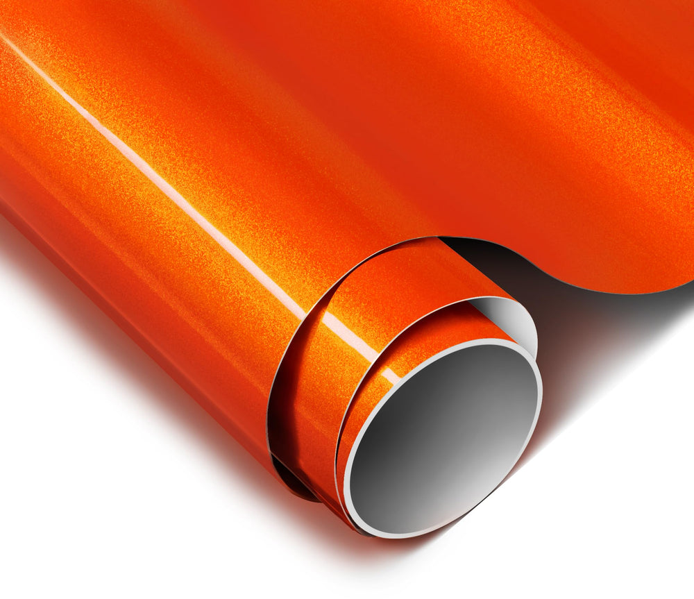 VViViD ColorFusion gloss flame orange film on car panel showcasing vibrant color retention.